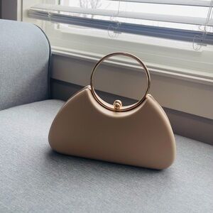 Elegant cream Handbag with Gold Accents